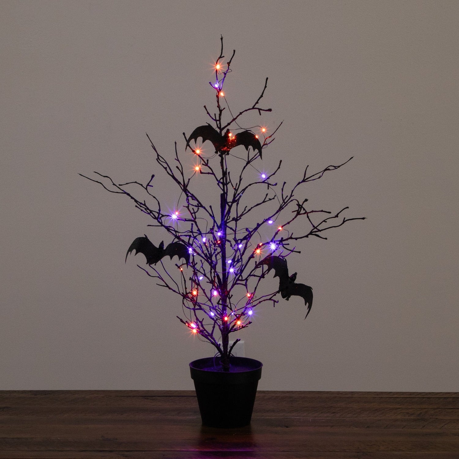 2' Pre-Lit Artificial Black Spooky Twig Tree with Bats and 40 Orange & Purple LED Lights