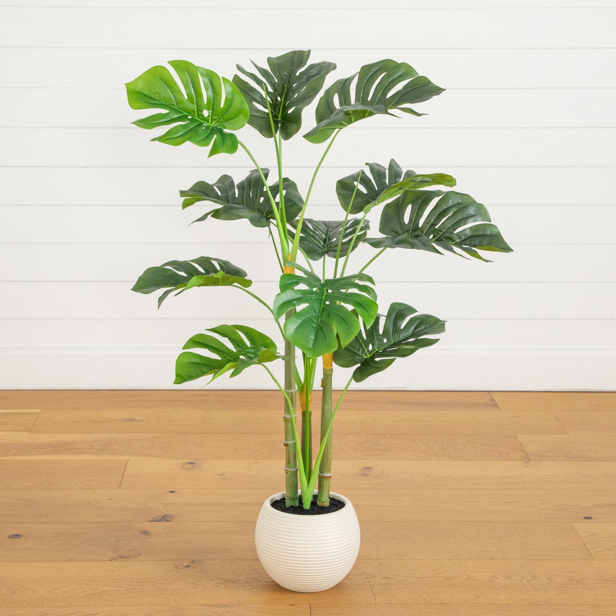 monstera deliciosa artificial plants 3.5' Artificial Monstera Tree in White Round Planter – Nearly Natural