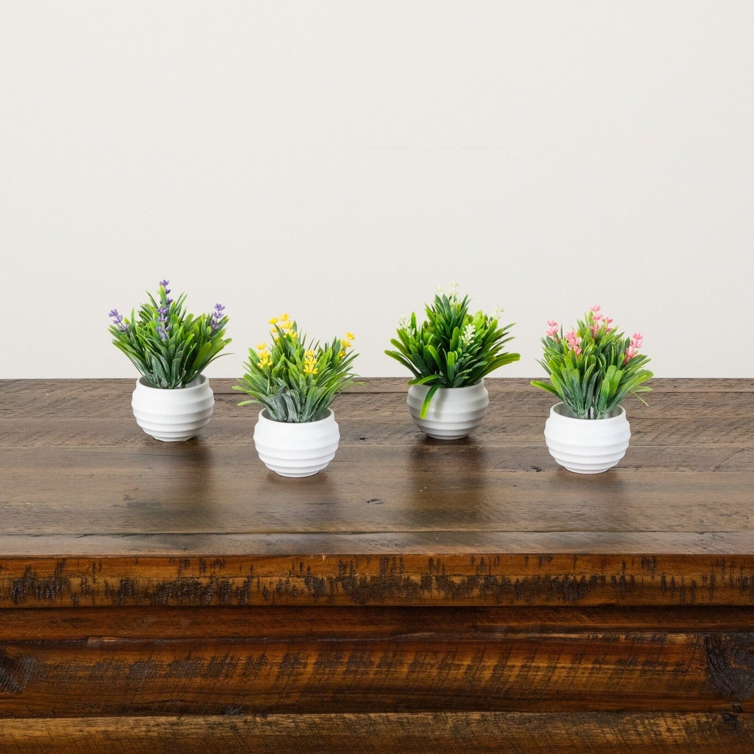 5" Artificial Mini Flowering Lavender Arrangement in White Decorative Oval Planter - Set of 4