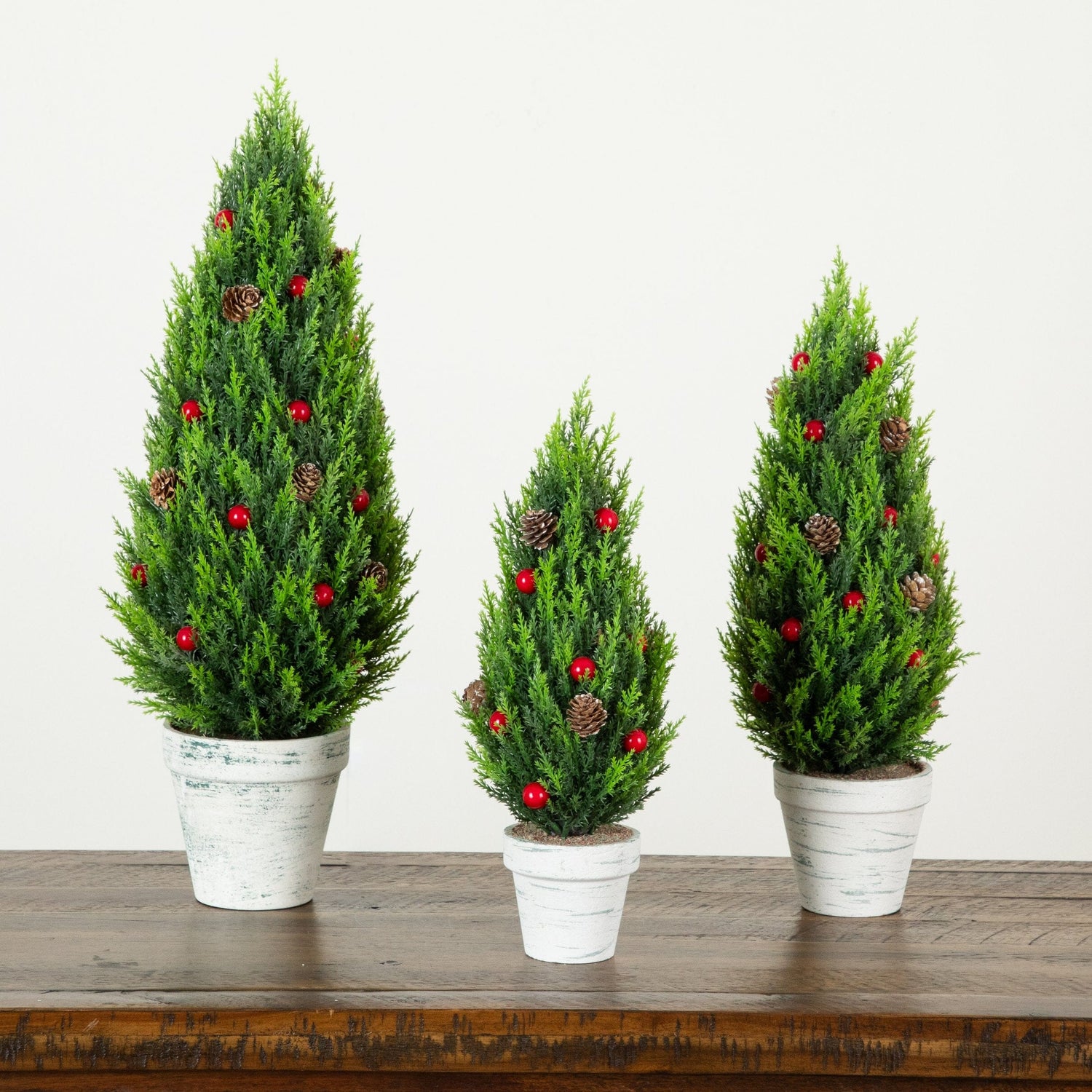 Artificial Holiday Cypress Trees in White Rustic Planters with Red Berries & Pinecones - Set of 3
