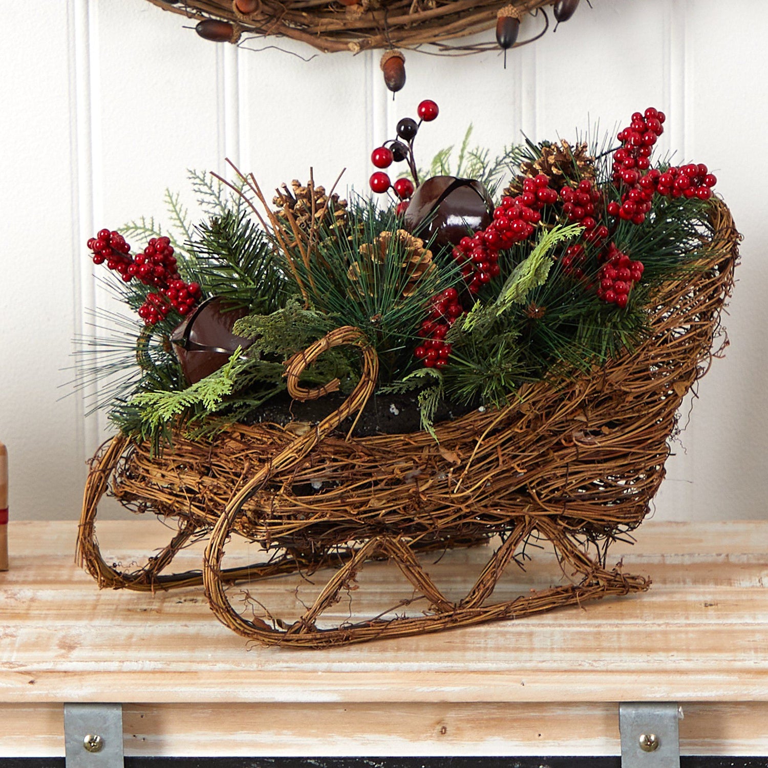 18” Christmas Sleigh with Pine, Pinecones and Berries Artificial Christmas Arrangement