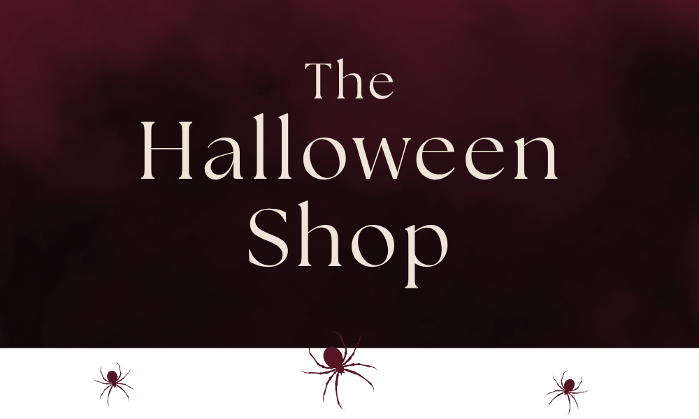 A Halloween-themed graphic with the words 'The Halloween Shop' in large cream serif text over a dark burgundy background, with small spider silhouettes along a white strip at the bottom.