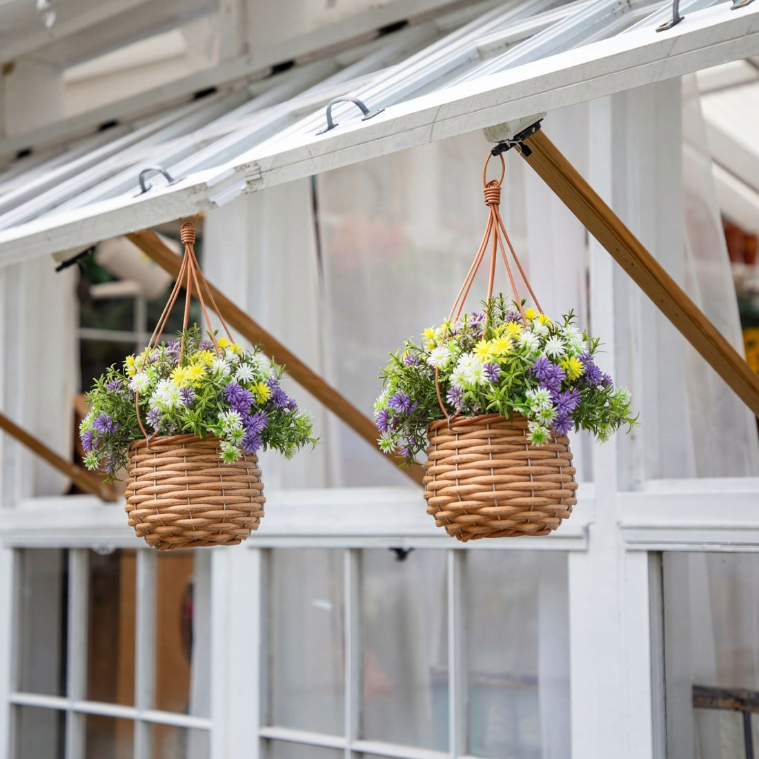 artificial plants in hanging baskets 13” UV Resistant Artificial Dandelion and Rosemary in Woven Hanging Basket (Indoor/Outdoor) -Set of 2