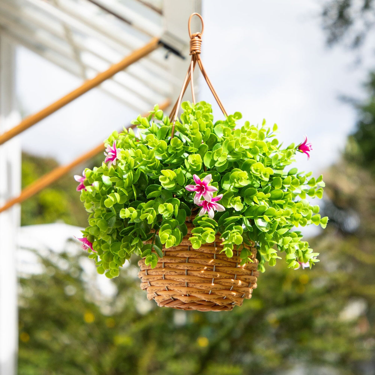 fake hanging plants outdoor 13” UV Resistant Artificial Lily and Eucalyptus Woven Hanging Basket ( –  Nearly Natural