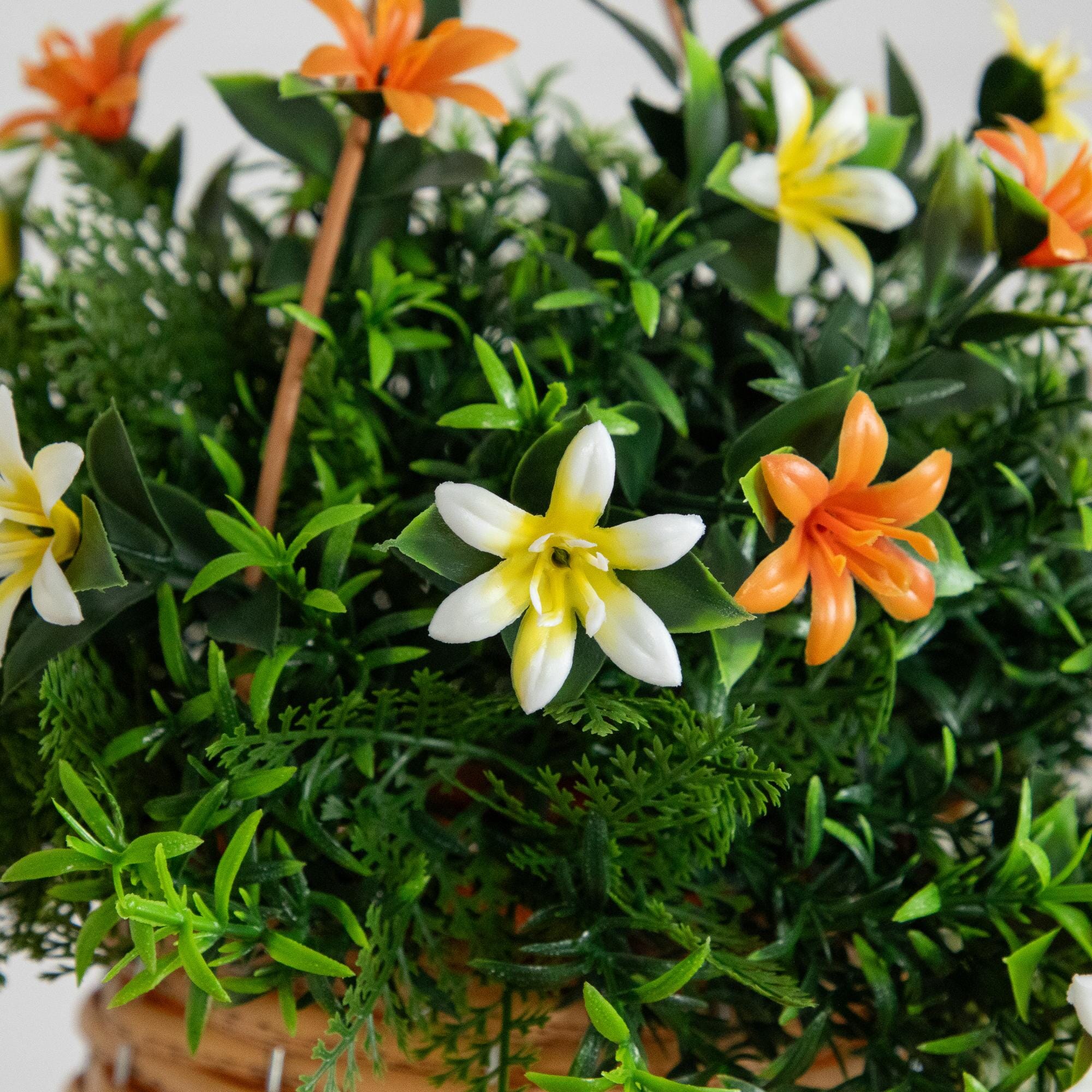 13” UV Resistant Artificial Lily and Mixed Greens in Woven Hanging