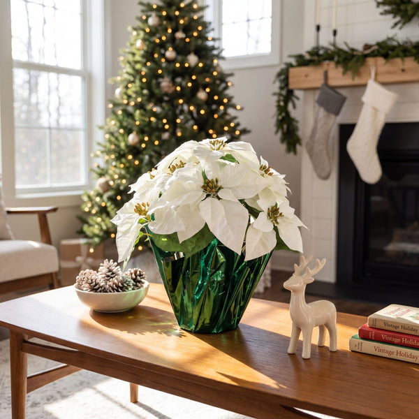 19" Artificial Lush White Velvet Poinsettia Arrangement in Green Wrapped Planter