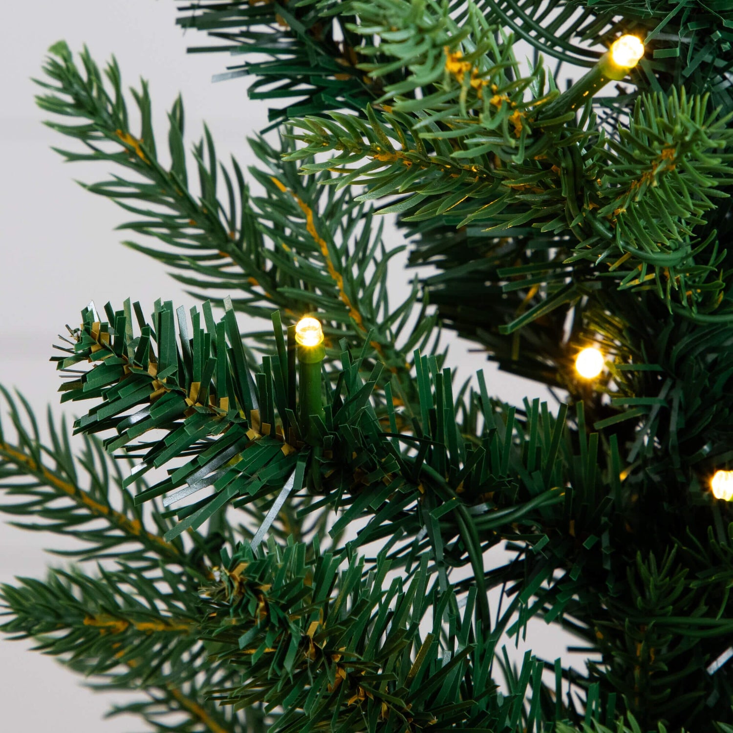 2' Pre-Lit Artificial Classic Christmas Tree with 35 Warm White LED Lights in Gold Decorative Planter