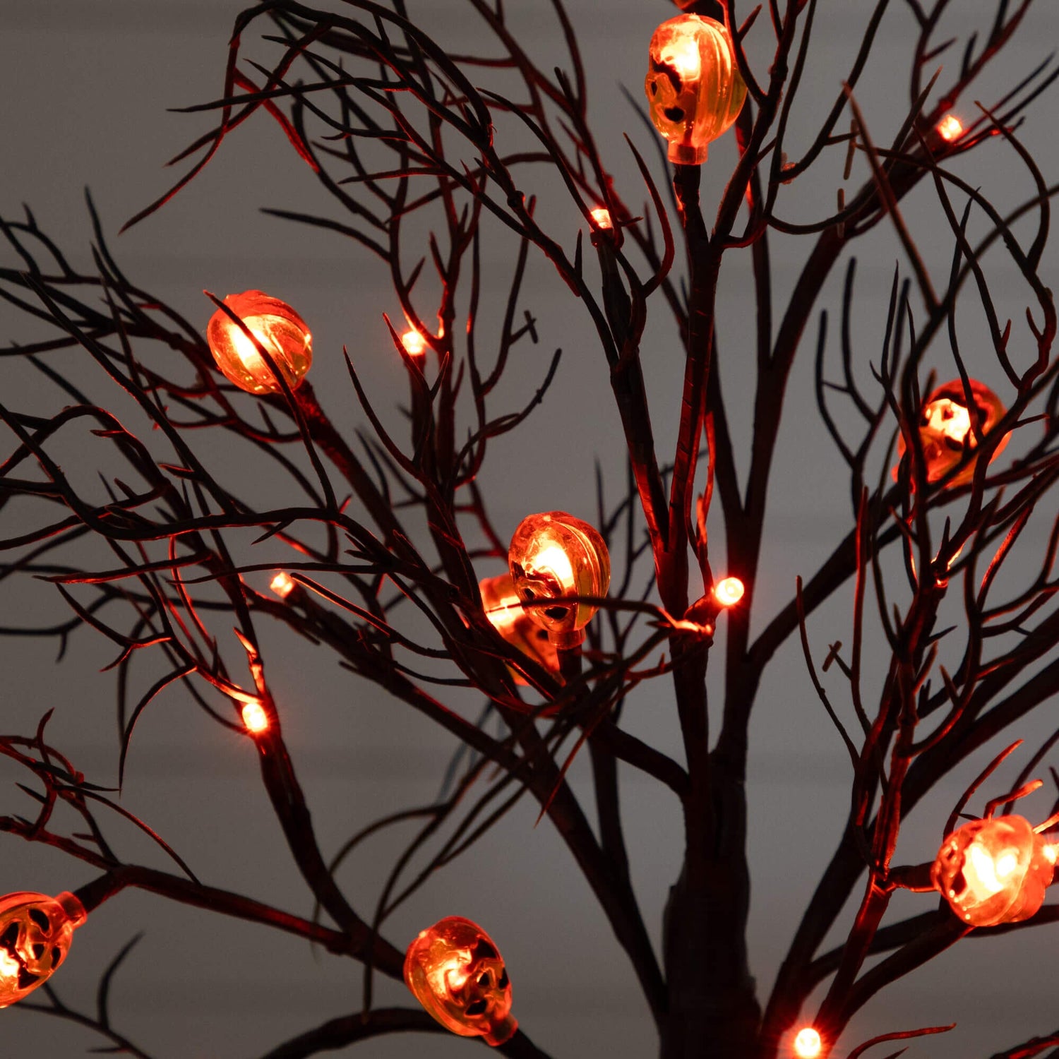 22" Pre-Lit Artificial Halloween Brown Twig Tree with 12 Orange LED Pumpkin Shaped Lights