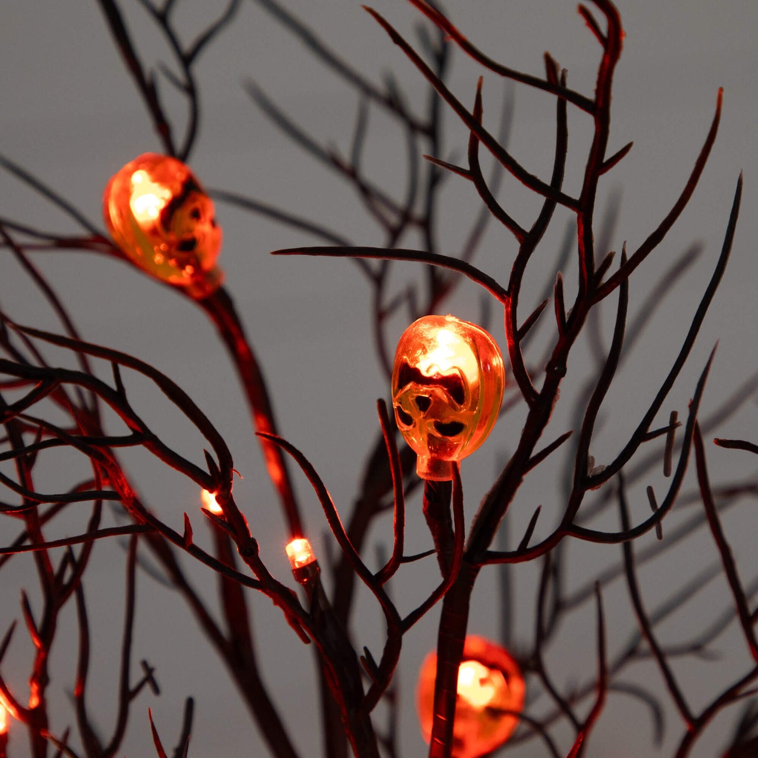 22" Pre-Lit Artificial Halloween Brown Twig Tree with 12 Orange LED Pumpkin Shaped Lights