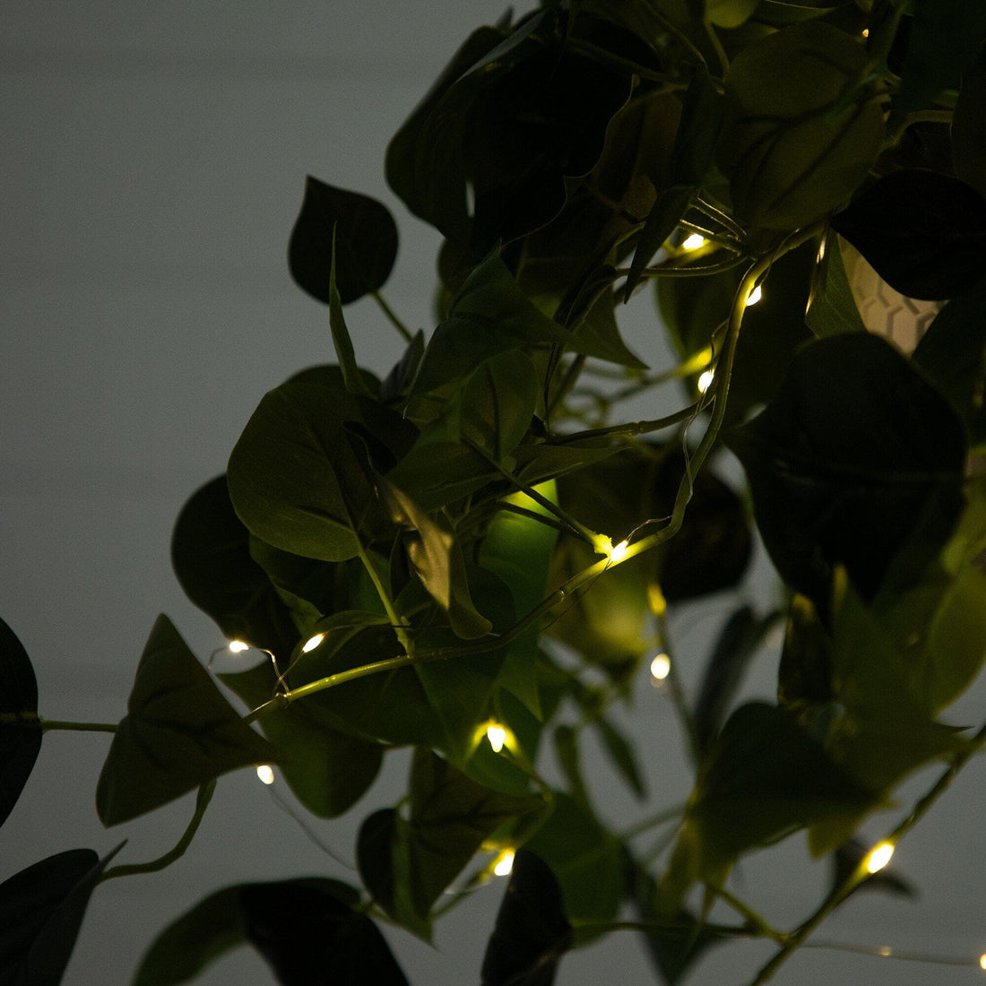 24” UV Resistant Artificial Philodendron with 50 Warm White LED Lights in  White Hanging Basket