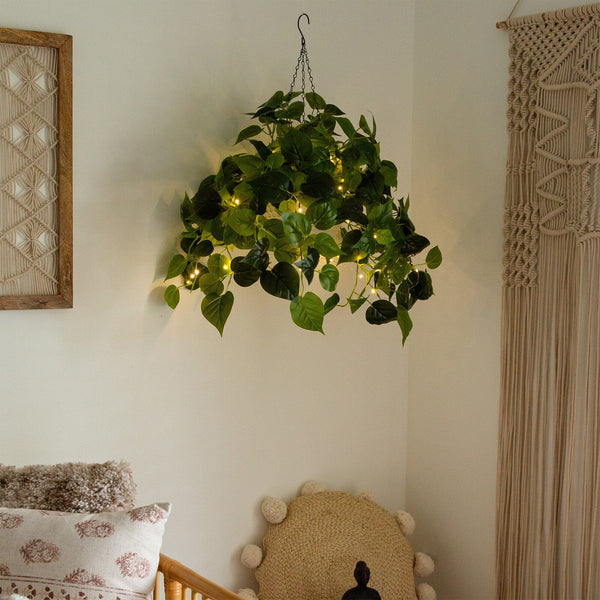 metal philodendron sculpture hanging 24” UV Resistant Artificial Philodendron with 50 Warm White LED Lights in White Hanging Basket