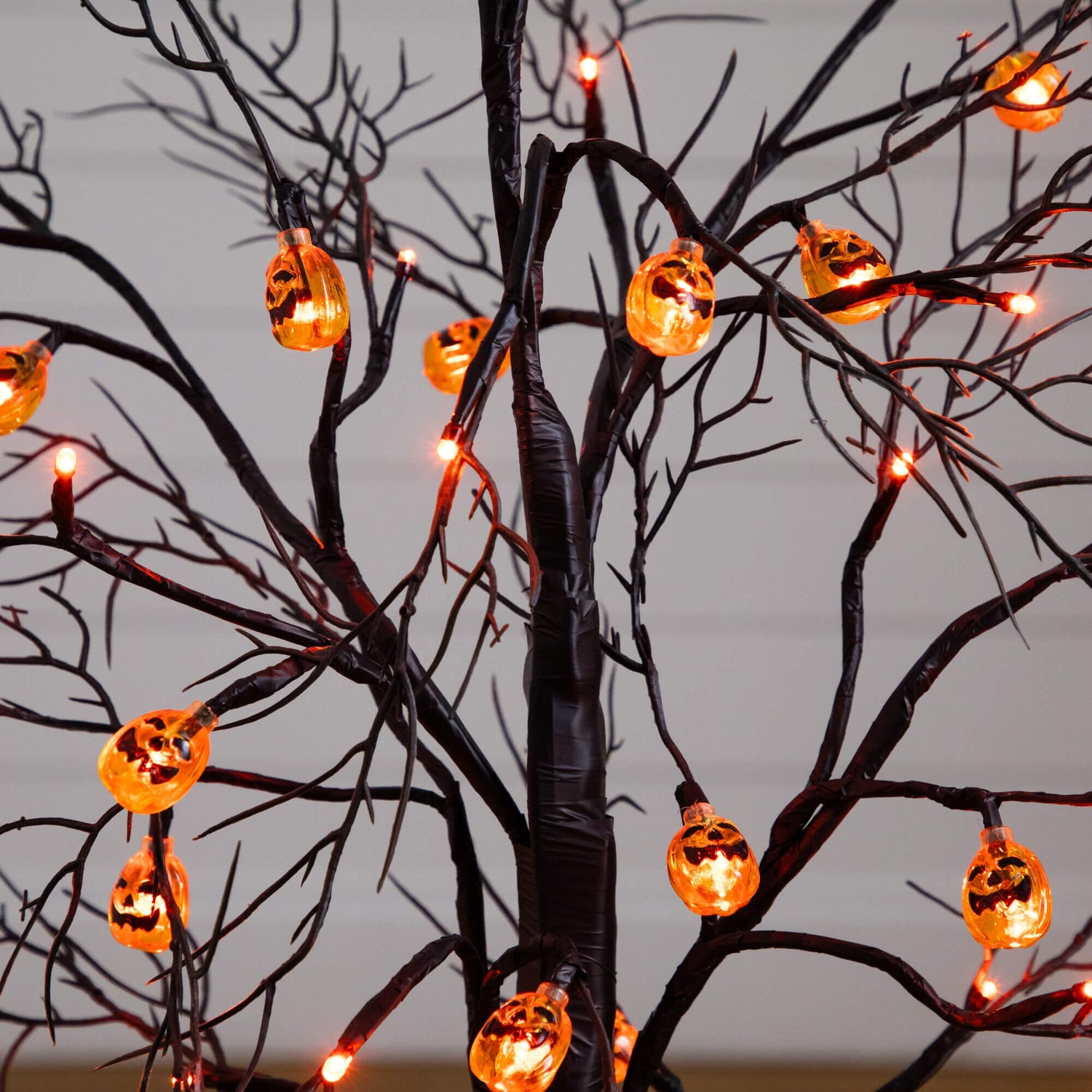 3' Pre-Lit Artificial Halloween Black Twig Tree with 18 Orange LED Pumpkin Shaped Lights