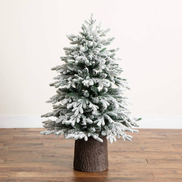 4' Pre-Lit Artificial Flocked Christmas Tree with 100 Warm White LED Lights in Decorative Trunk Planter