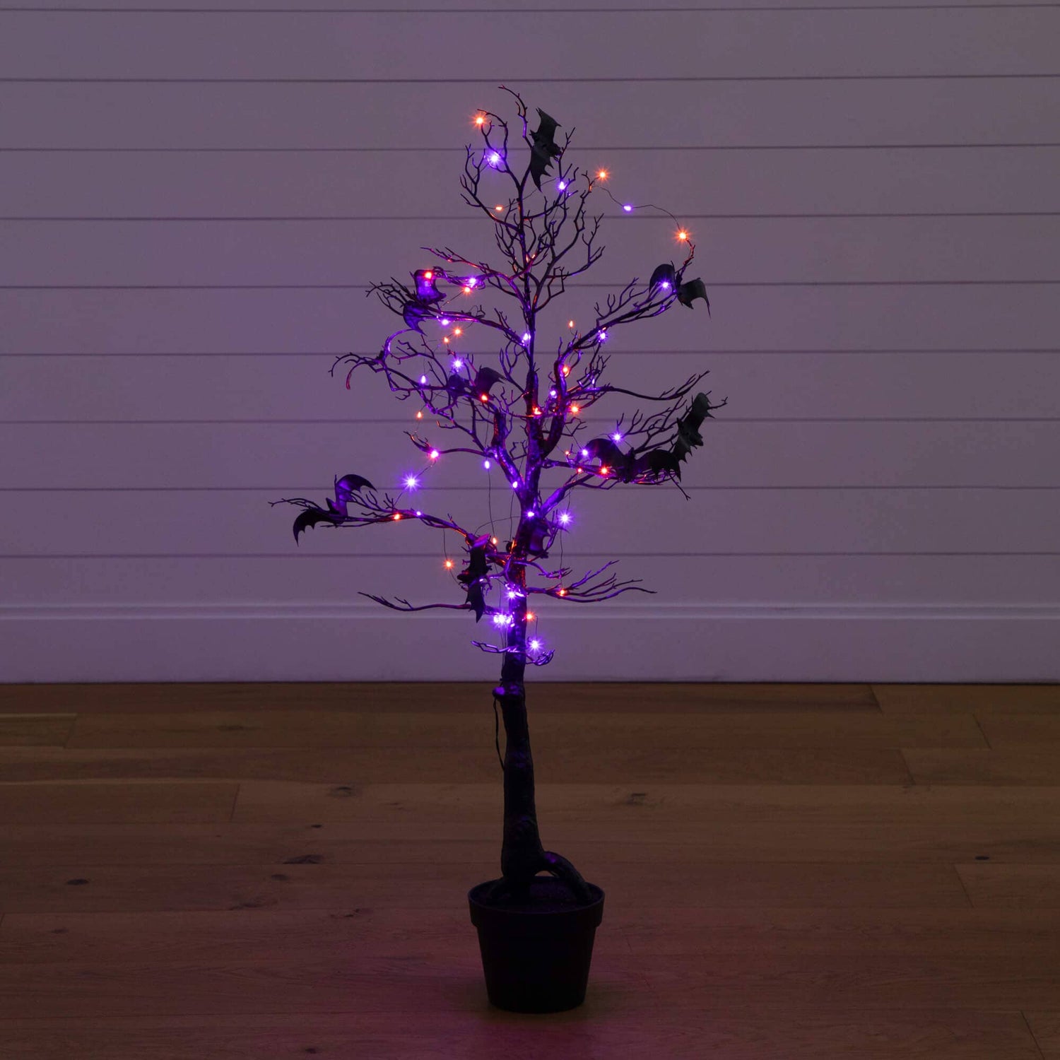 4' Pre-Lit Artificial Halloween Black Spooky Twig Tree with Bats and 120 Orange & Purple LED Lights