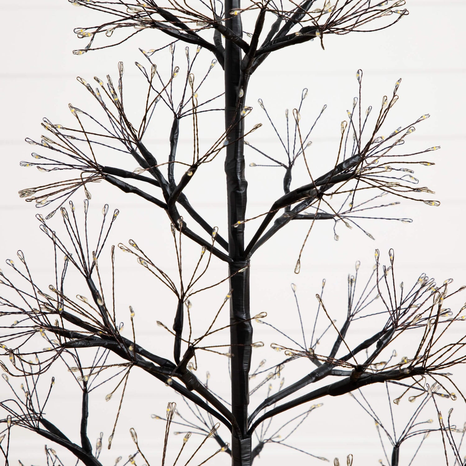 4' Pre-Lit Artificial Halloween Black Starburst Tree with 800 Fairy Warm White LED Lights