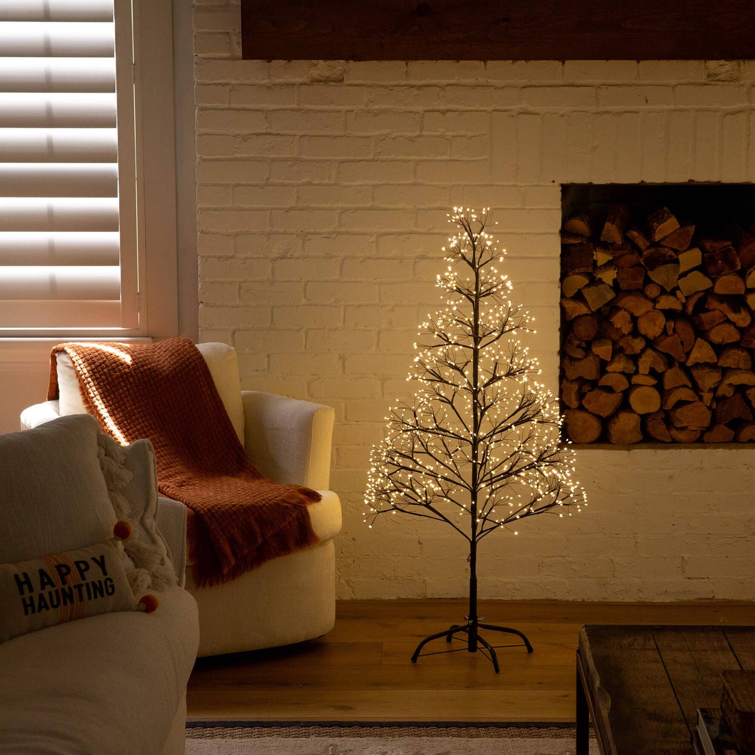 4' Pre-Lit Artificial Halloween Black Starburst Tree with 800 Fairy Warm White LED Lights