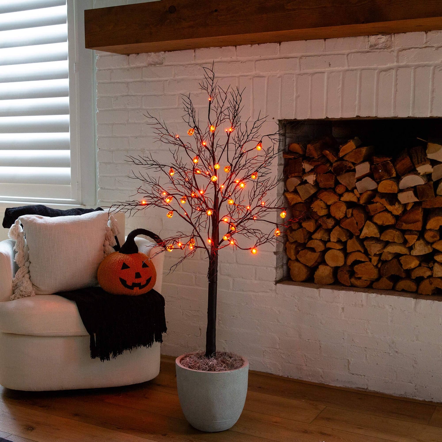 4' Pre-Lit Artificial Halloween Black Twig Tree with 24 Orange LED Pumpkin Shaped Lights