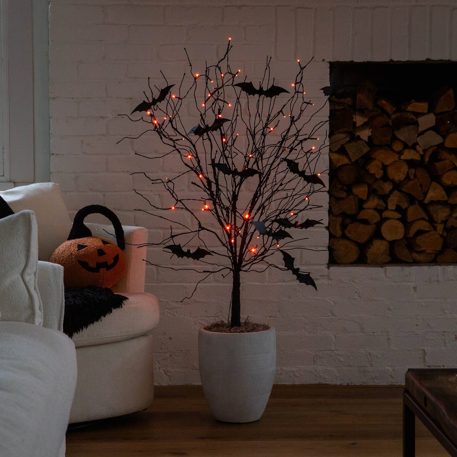 4' Pre-Lit Artificial Halloween Black Twig Tree with Bats and 50 Orange LED Lights