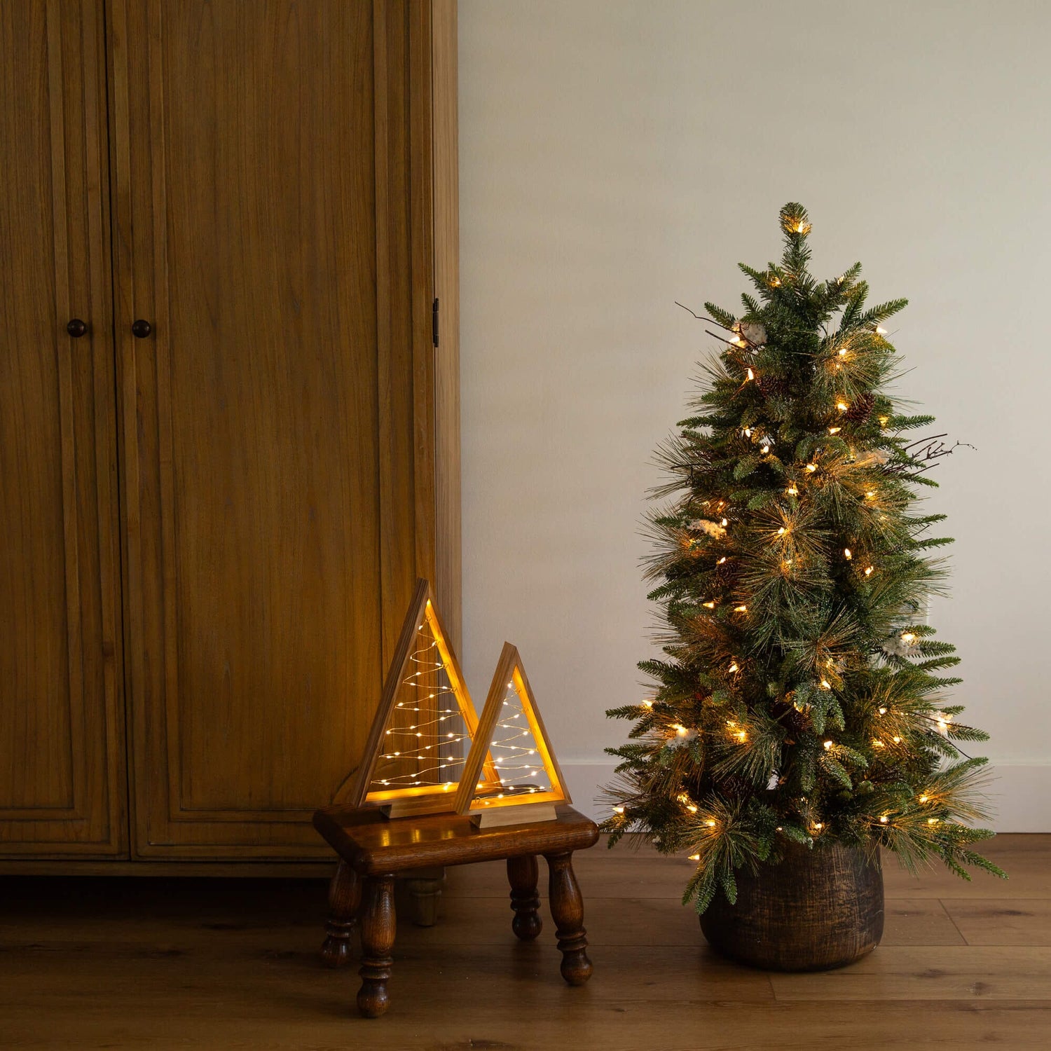 4' Pre-Lit Artificial Mixed Pine Snowed Christmas Tree with Pinecones in Decorative Planter with 60 Warm White LED Lights