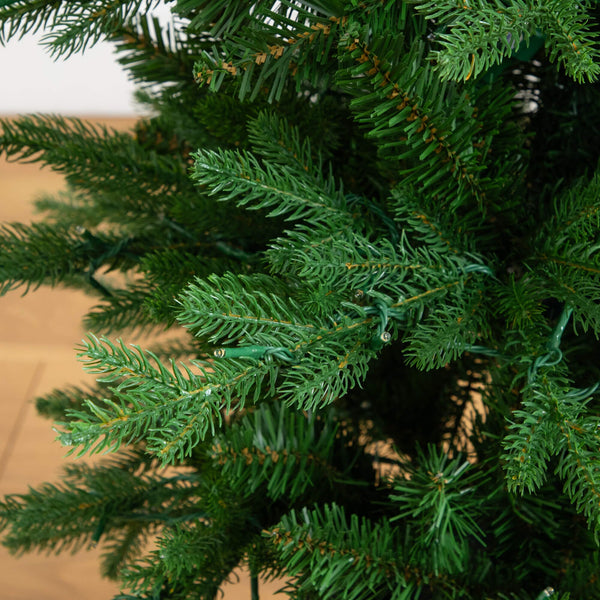 4.5' Pre-Lit Artificial Christmas Tree in Decorative Planter with 60 Clear LED Lights