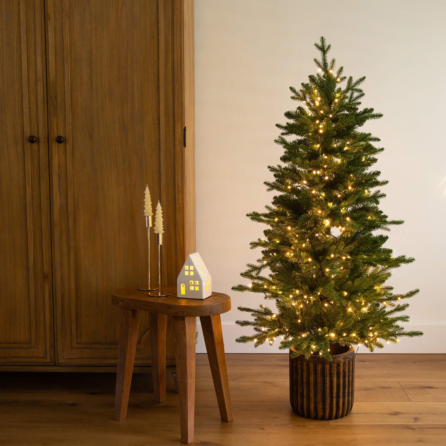 4.5' Pre-Lit Artificial Christmas Tree in Decorative Planter with 60 Clear LED Lights