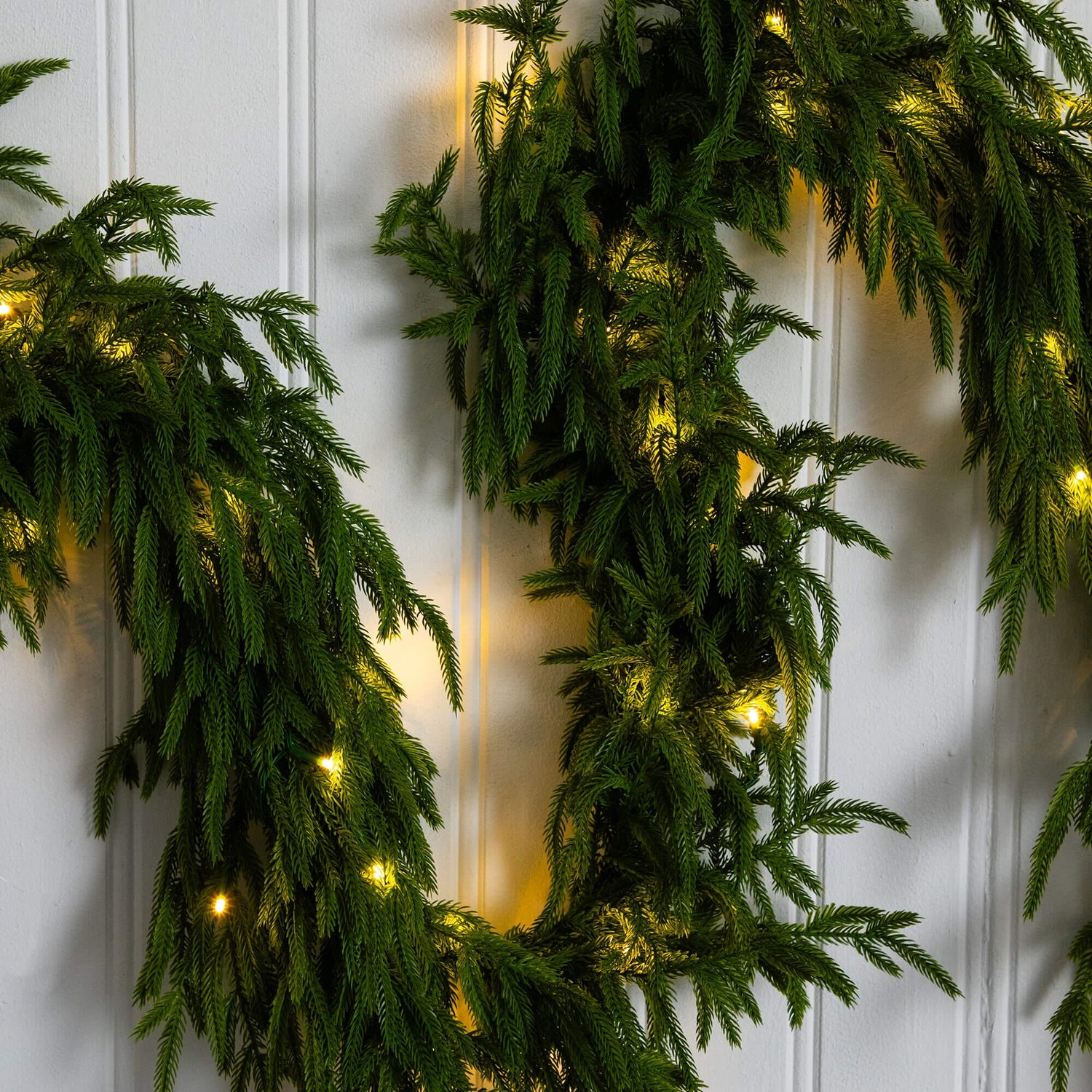 9' Pre-Lit Artificial Real Touch Norfolk Island Pine Garland with 50 Warm White LED Lights and Natural Look
