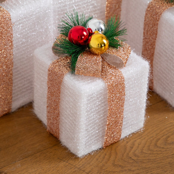 Pre-Lit Christmas Gift Boxes with LED Lights and Festive Gift Toppers - Set of 4