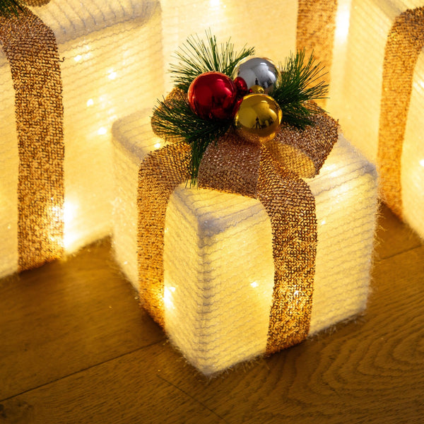 Pre-Lit Christmas Gift Boxes with LED Lights and Festive Gift Toppers - Set of 4