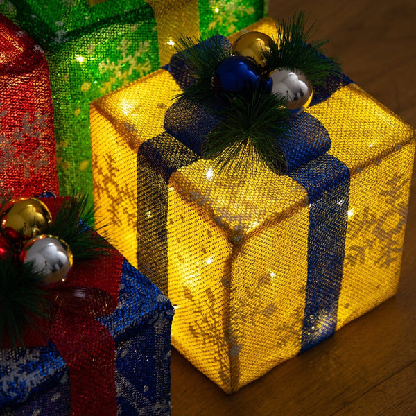 Pre-Lit Christmas Multicolor Gift Boxes with LED Lights and Festive Gift Toppers - Set of 4