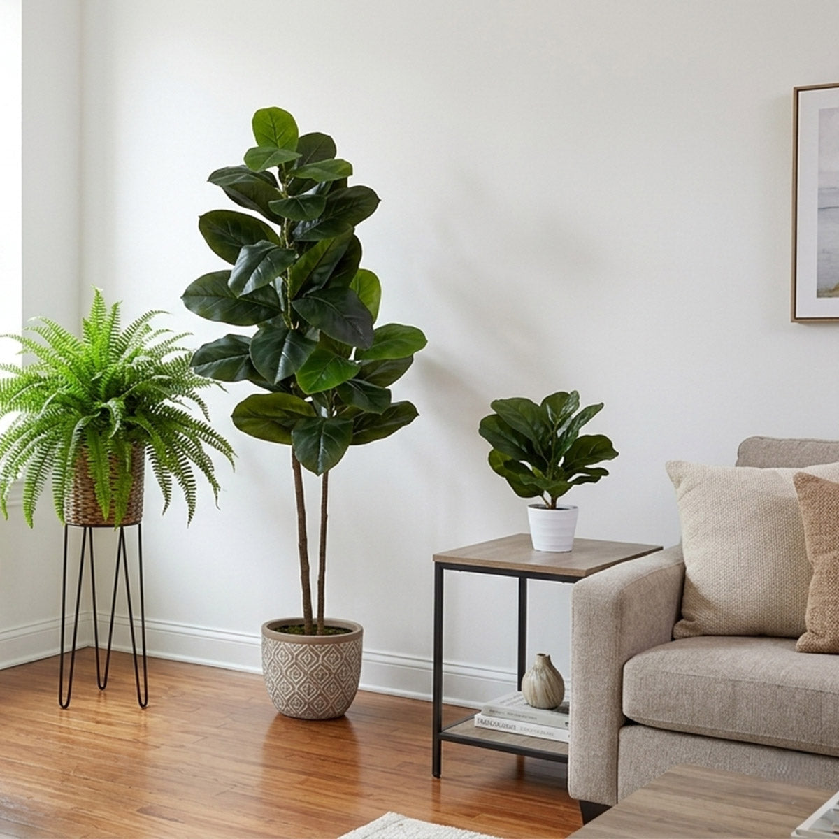 corner of living room with 3 faux plants next to a sofa