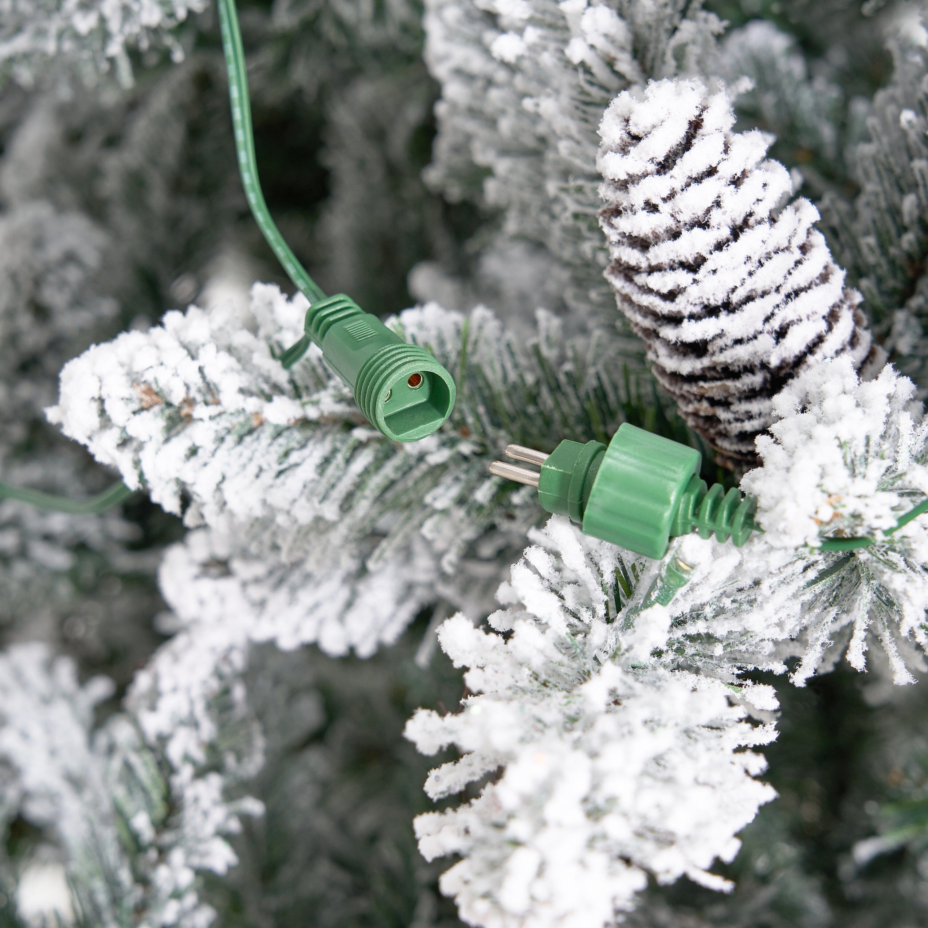 11' Flocked Livingston Fir Artificial Christmas Tree with Pine