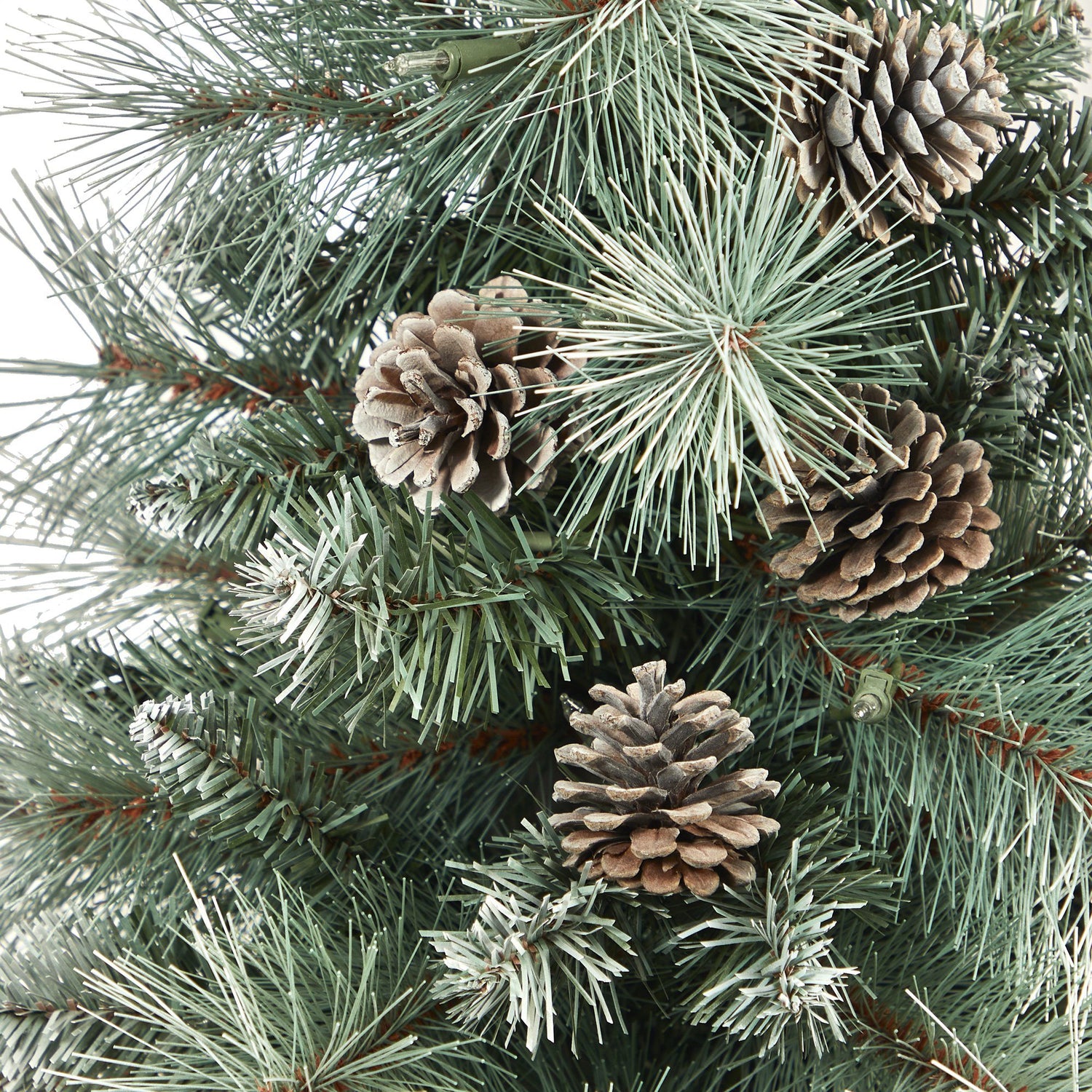 3.5’ Frosted Tip British Columbia Mountain Pine Artificial Christmas Tree with 50 Clear Lights, Pine Cones and 112 Bendable Branches in Metal Planter