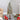 4’ Flocked Grand Alpine Artificial Christmas Tree with 100 Lights and 361 Branches on Natural Trunk