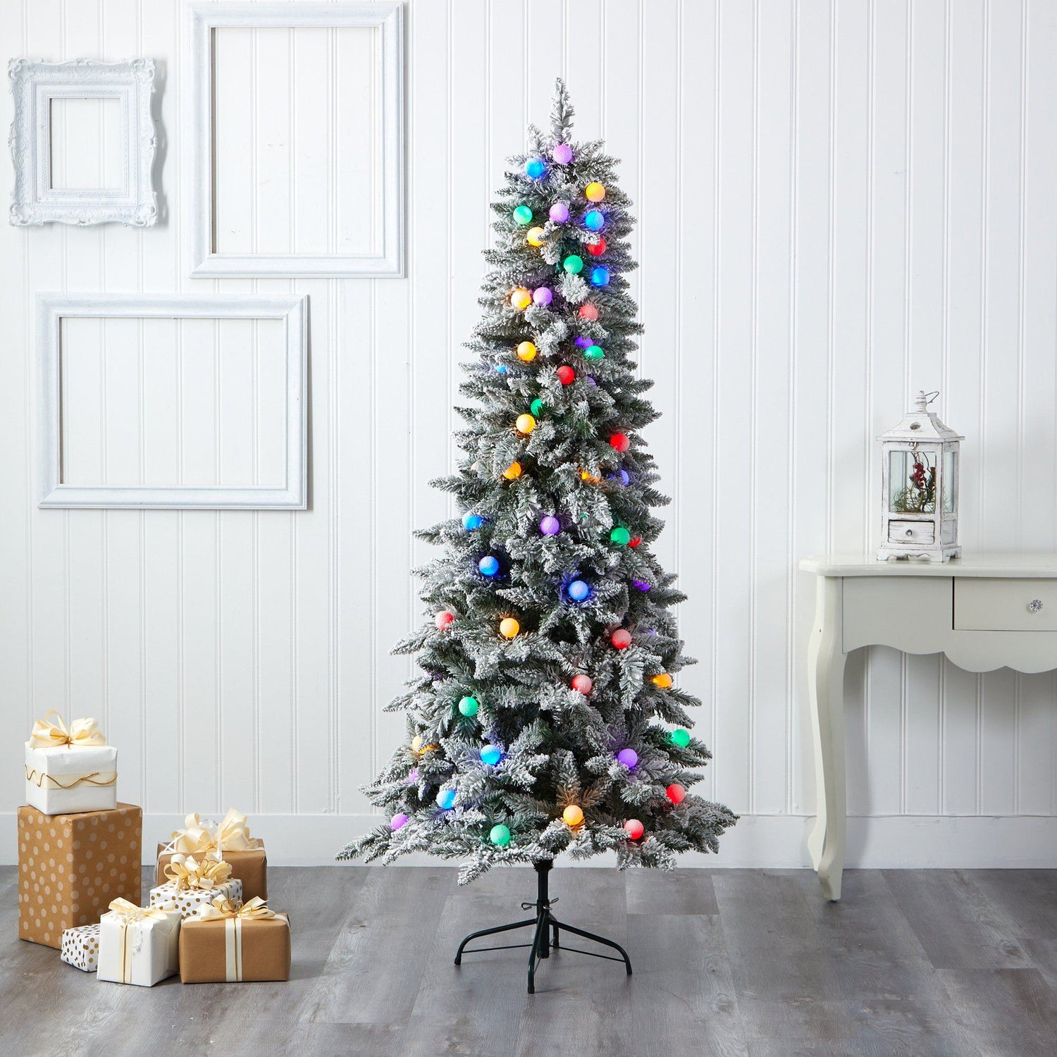 6.5' Flocked British Columbia Mountain Fir Artificial Christmas Tree with 75 Multi Color Globe Bulbs and 679 Bendable Branches